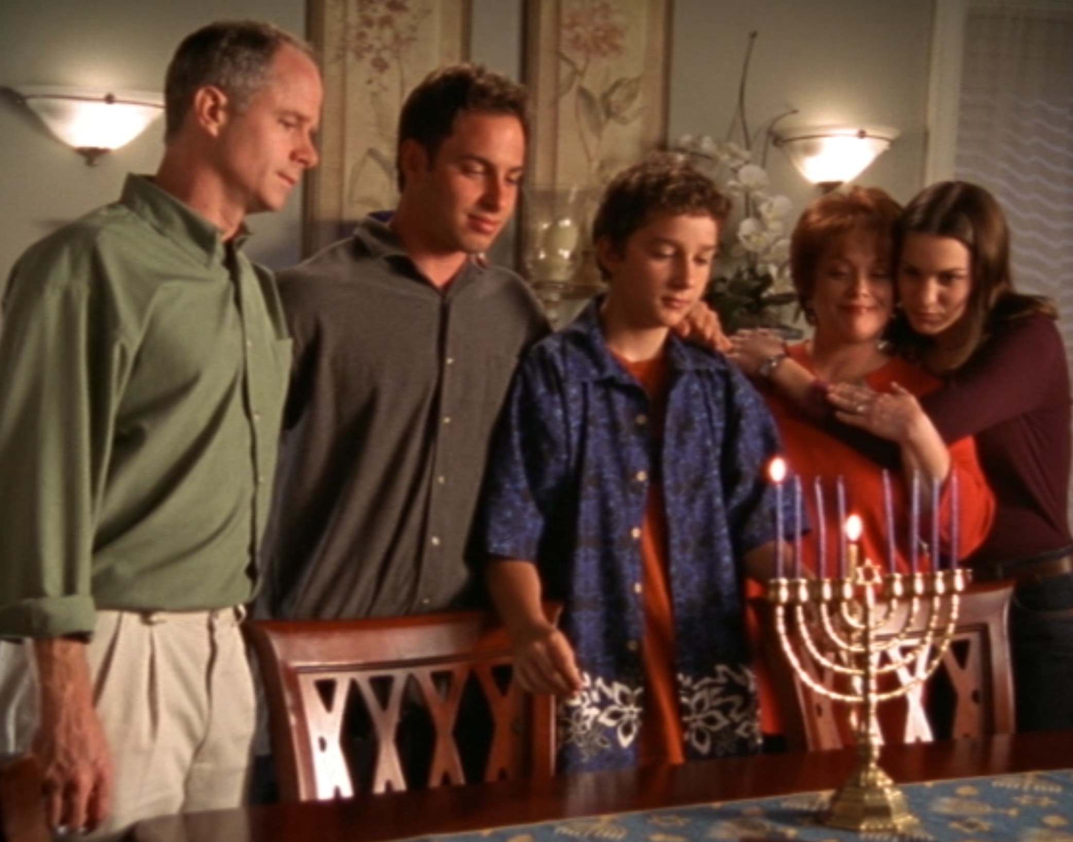 The Stevens Family gathers for a menorah lighting to celebrate Hanukkah in &quot;Even Stevens&quot;