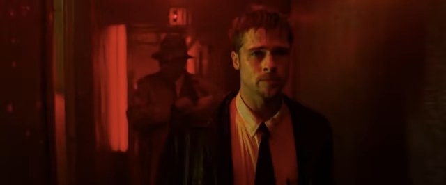 Mills and Somerset walking down a red-lit hallway in &quot;Se7en&quot;