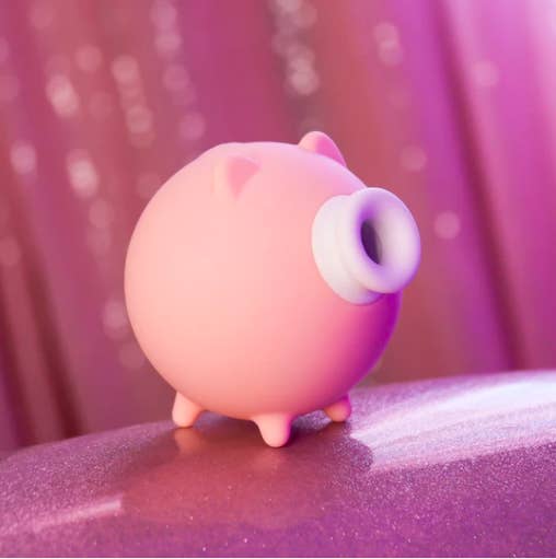 pink pig whose face is a suction tip