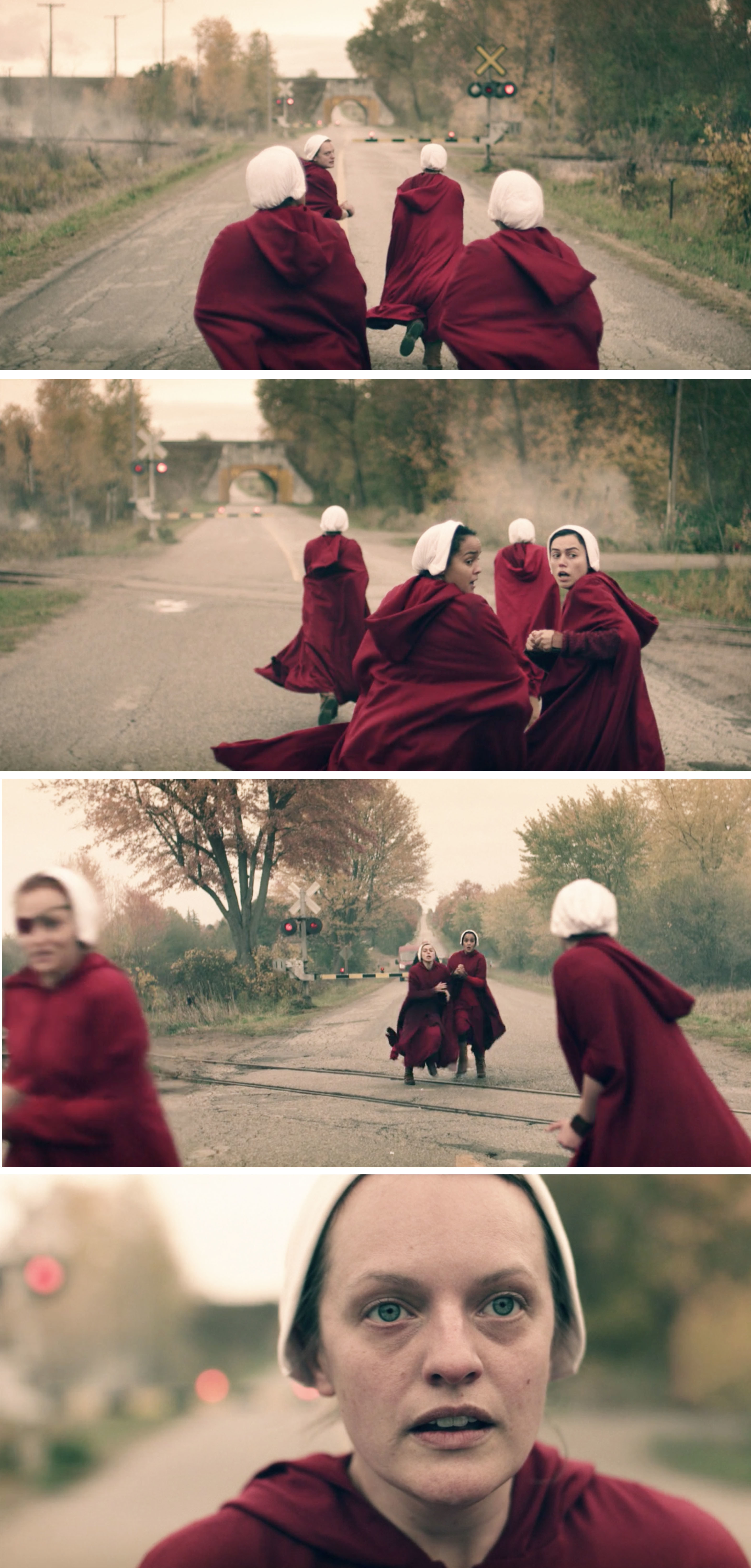 The Handmaid&#x27;s running down a road towards the train tracks