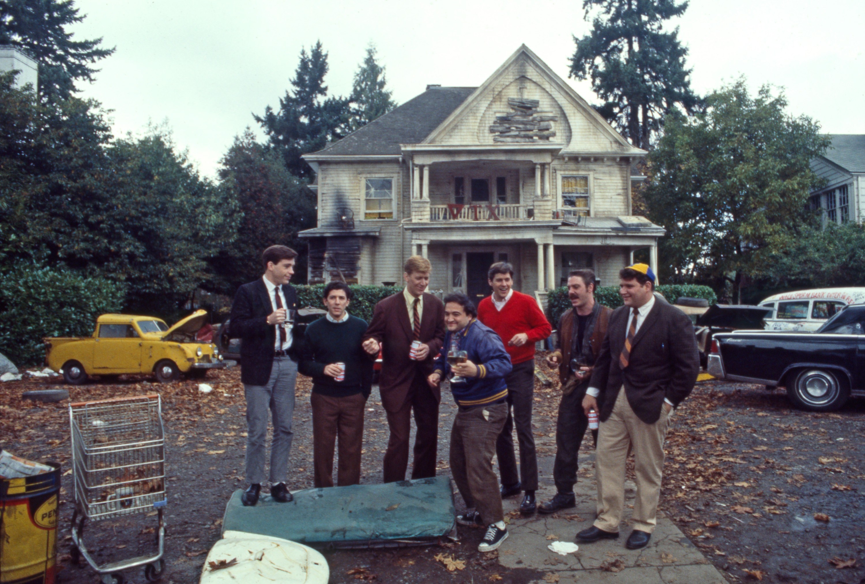 frat boys in front of their house