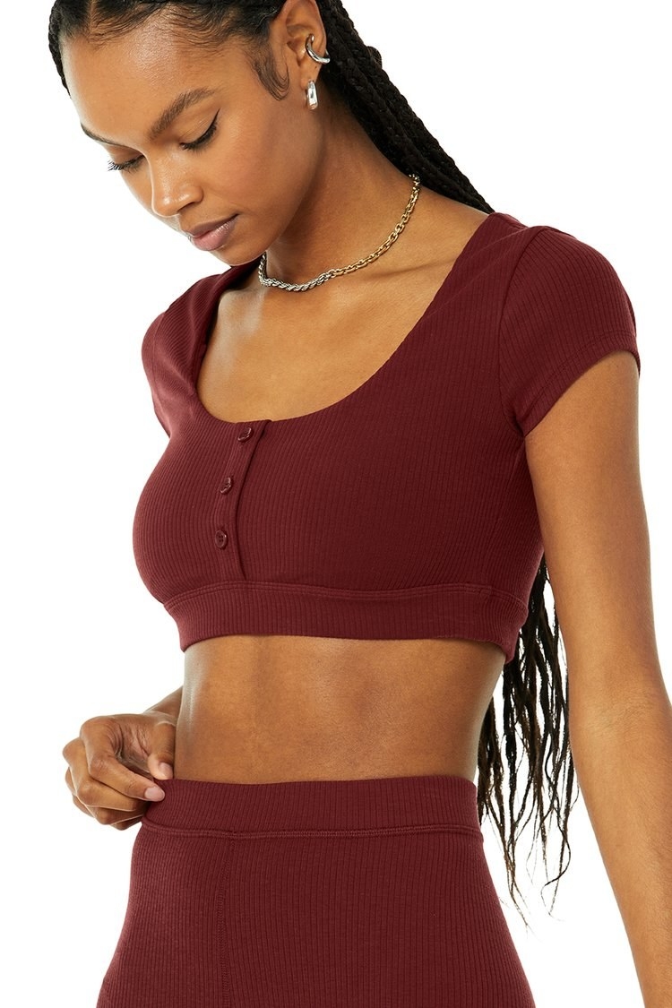 Model wearing henley bra top in color &quot;Cranberry&quot;