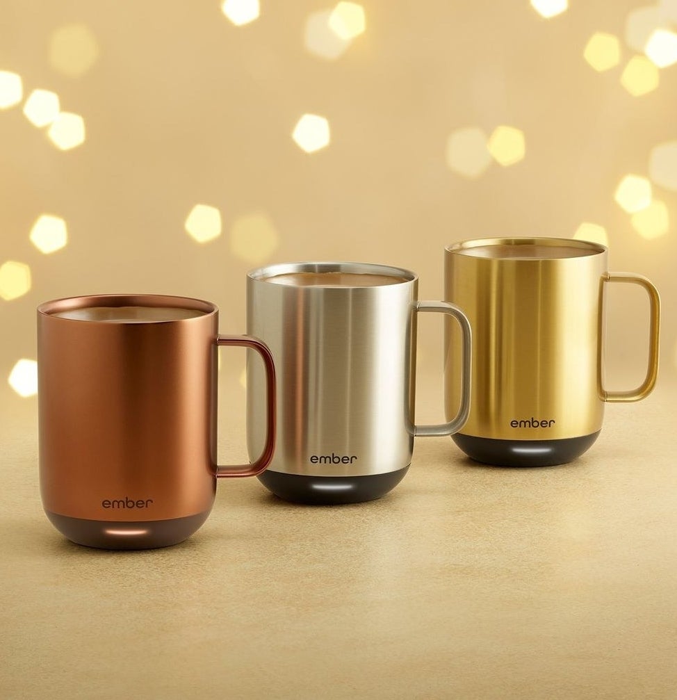 Three smart mugs in copper, silver, and gold