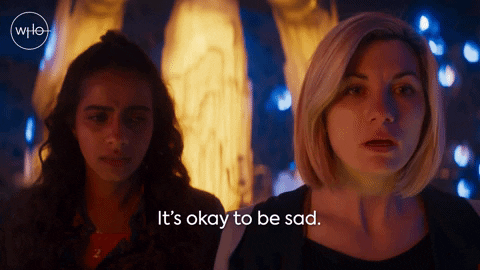 GIF featuring two women with "it's okay to be sad" written on it