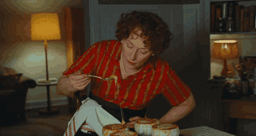 Meryl Streep tasting her food in &quot;Julie and Julia.&quot;