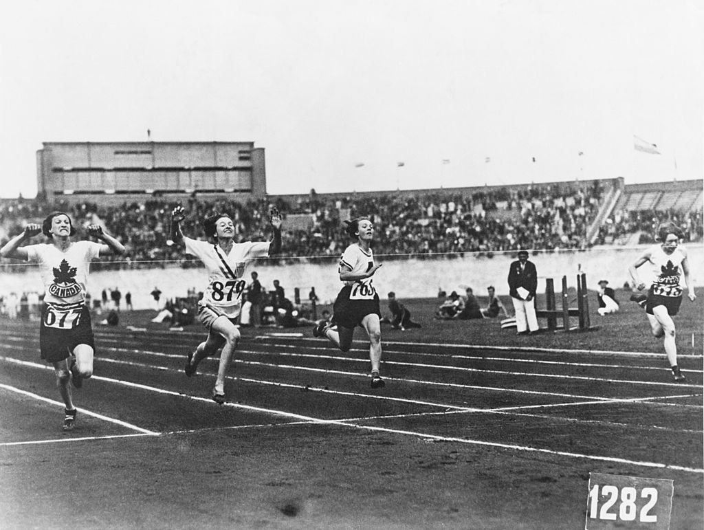 American athlete Betty Robinson wins the final of the women&#x27;s 100 Metres event during the Olympic Games at the Olympic Stadium, Amsterdam, 31st July 1928.