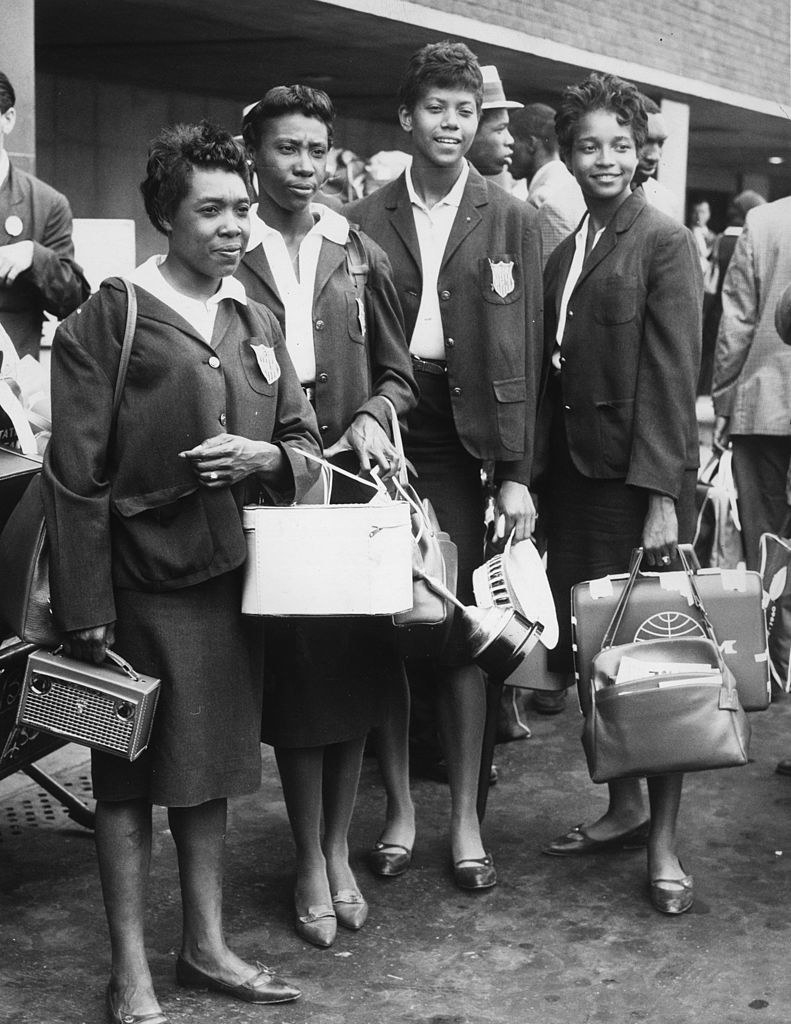 12th September 1960:  The &#x27;Tennessee Tiger Belles&#x27;, the American athletic team who collected three gold medals in the 1960 Olympic Games, arrive at London Airport from Rome for the Commonwealth versus USA athletics meeting at White City.