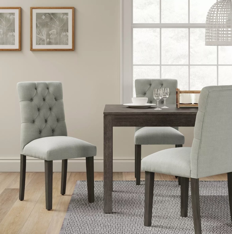 Tufted gray kitchen chairs at kitchen table