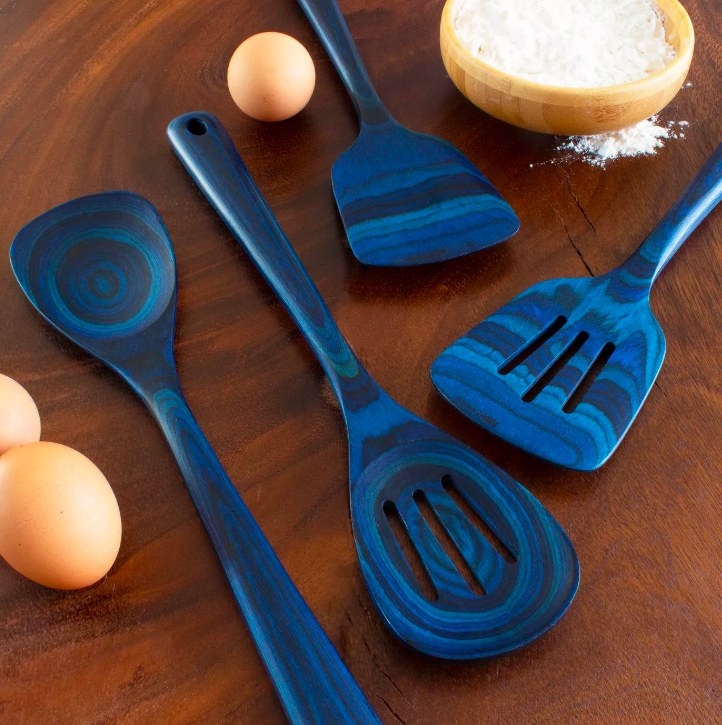 The blue utensil set, with two slotted and two solid serving utensils
