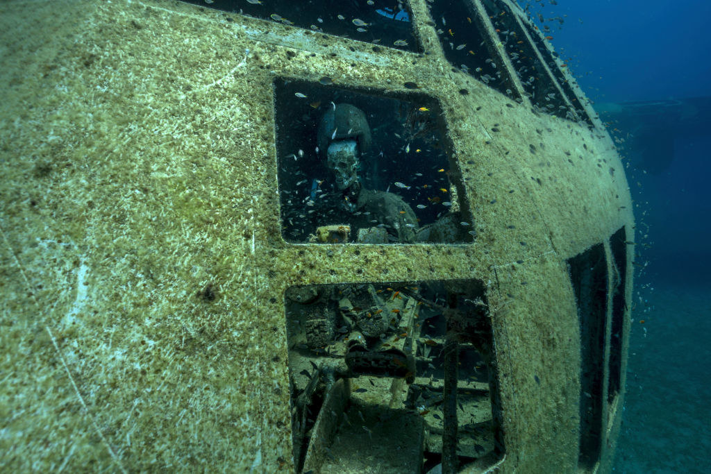A dummy skeleton in a sunken submarine