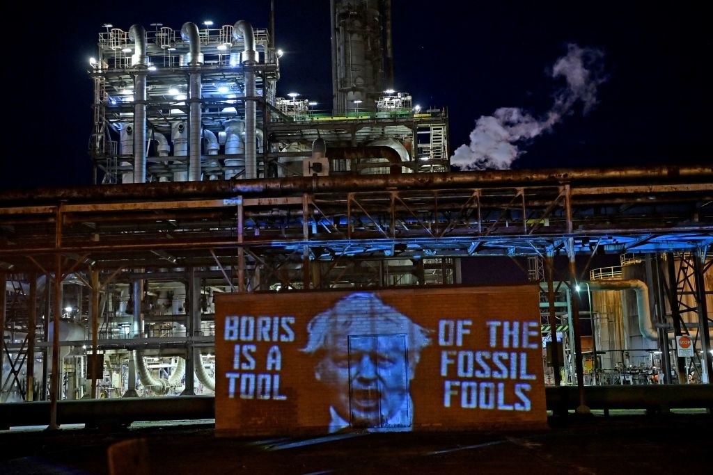 A banner that says &quot;Boris Is A Tool Of The Fossil Fools&quot;