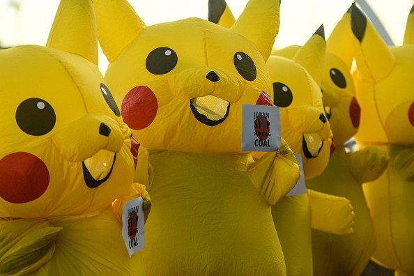 Protesters wearing Pikachu costumes