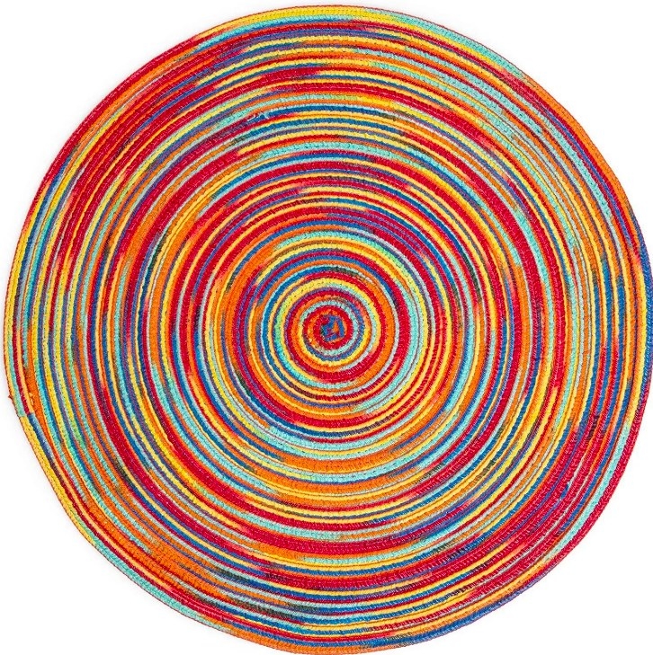 A single round braided fabric rainbow placemat
