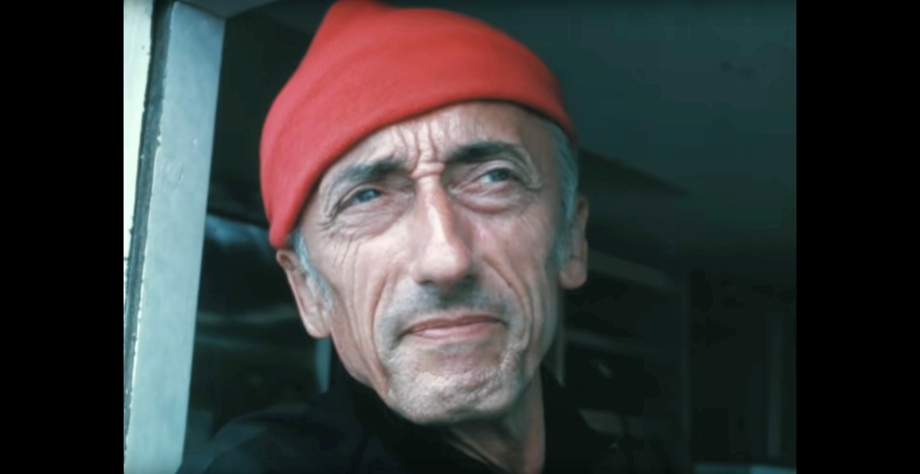 Jacques-Yves Cousteau staring out into the distance