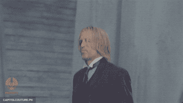 Haymitch giving a thumbs up