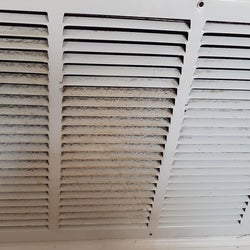 the vent cover half dirty half clean