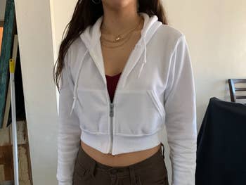 reviewer photo wearing white cropped hoodie