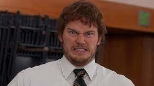 Chris Pratt&#x27;s character in a scene from Parks and Rec grimacing