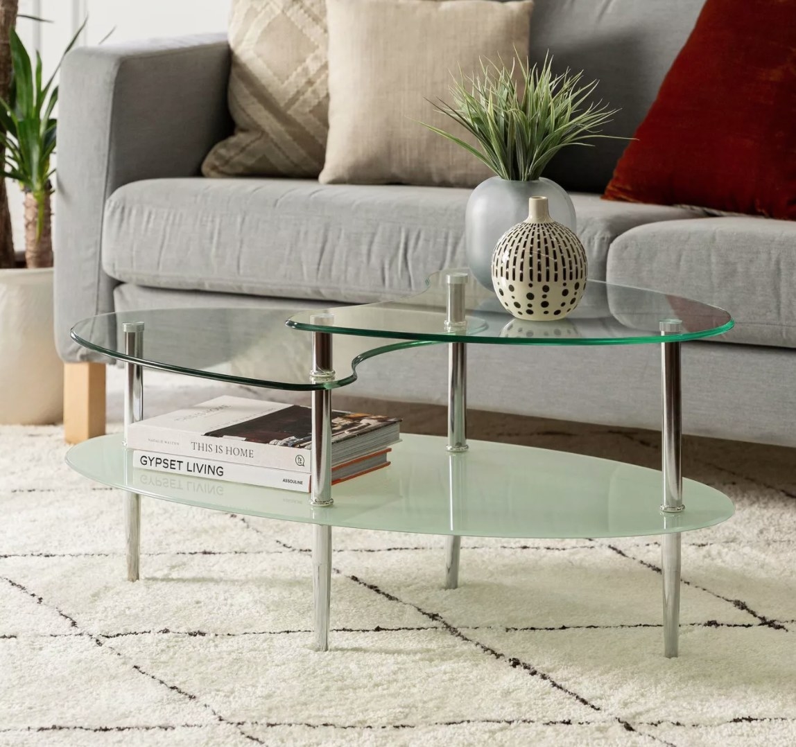 glass oval coffee table with multiple layers