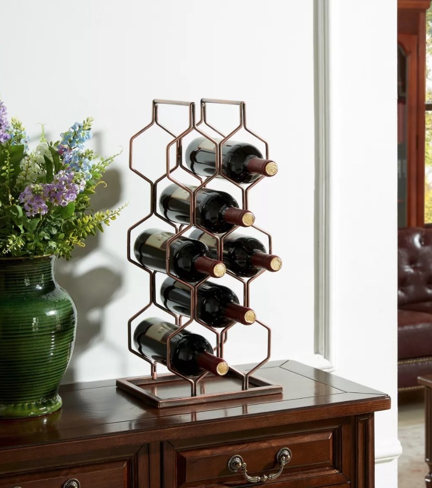 Iron wine rack with copper finish