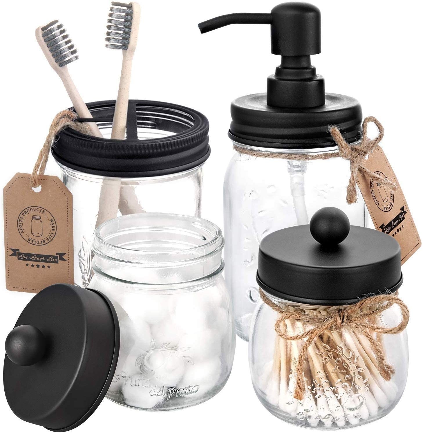 The four mason jars with black tops. One has a soap dispenser, another is holding two tooth brushes, and two smaller jars have easy-to-lift tops filled with cotton balls and swabs