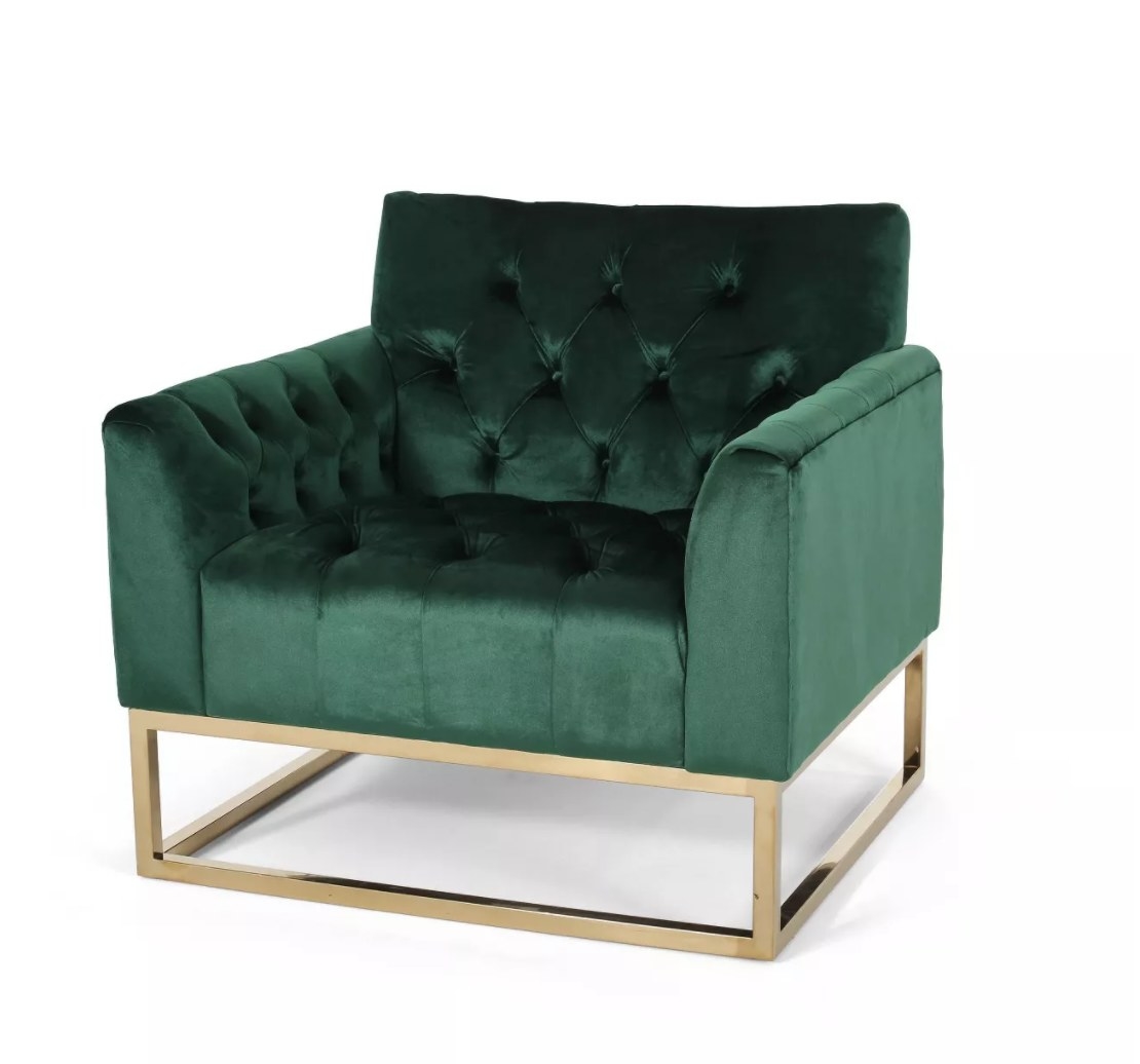 the square tufted velvet armchair in emerald green with brass legs