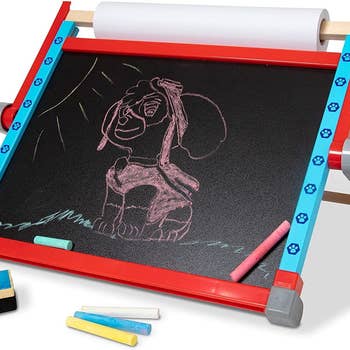 The tabletop easel with some doodles on it