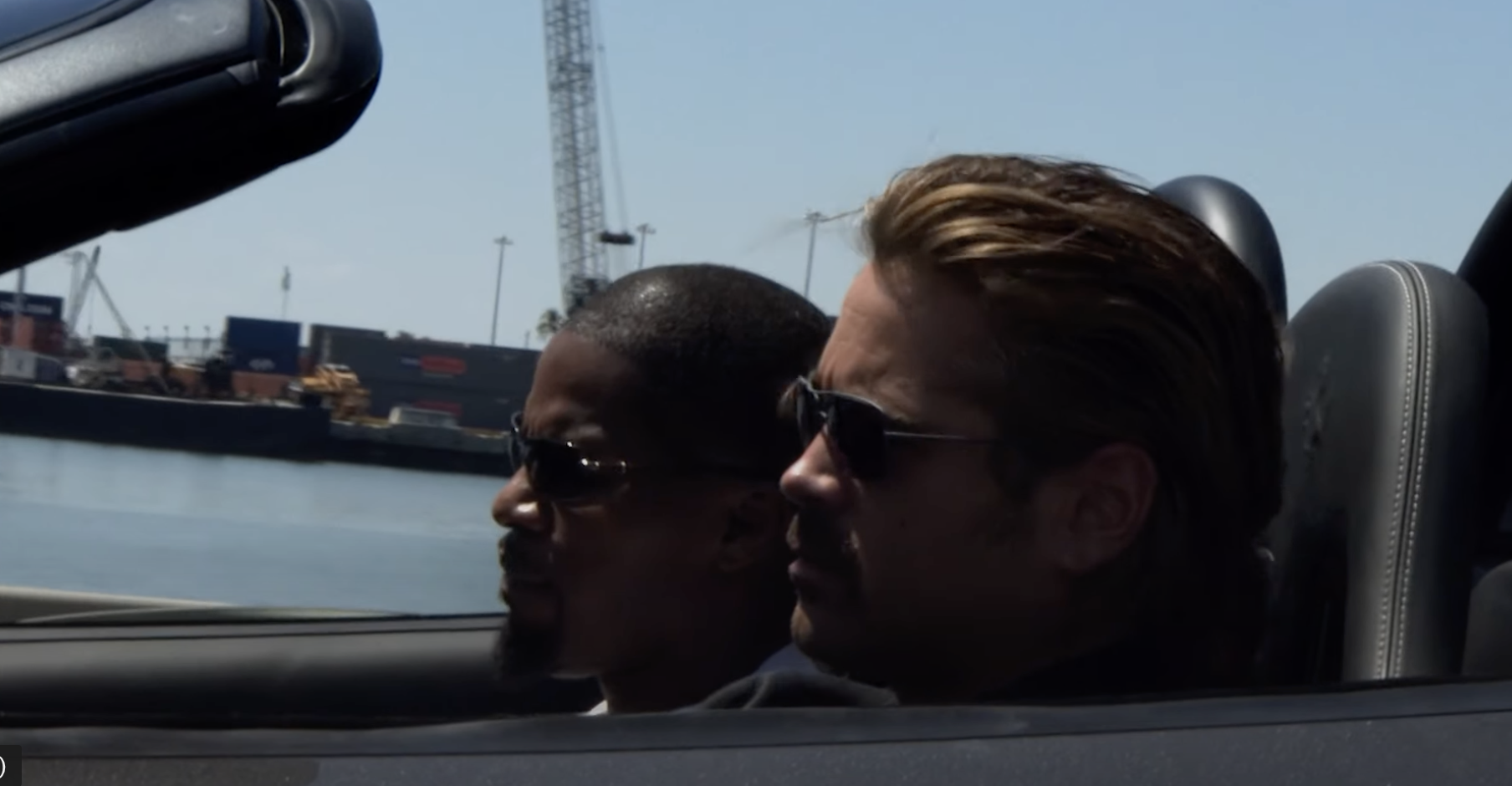 Farrell and Jamie Foxx driving a car in the film