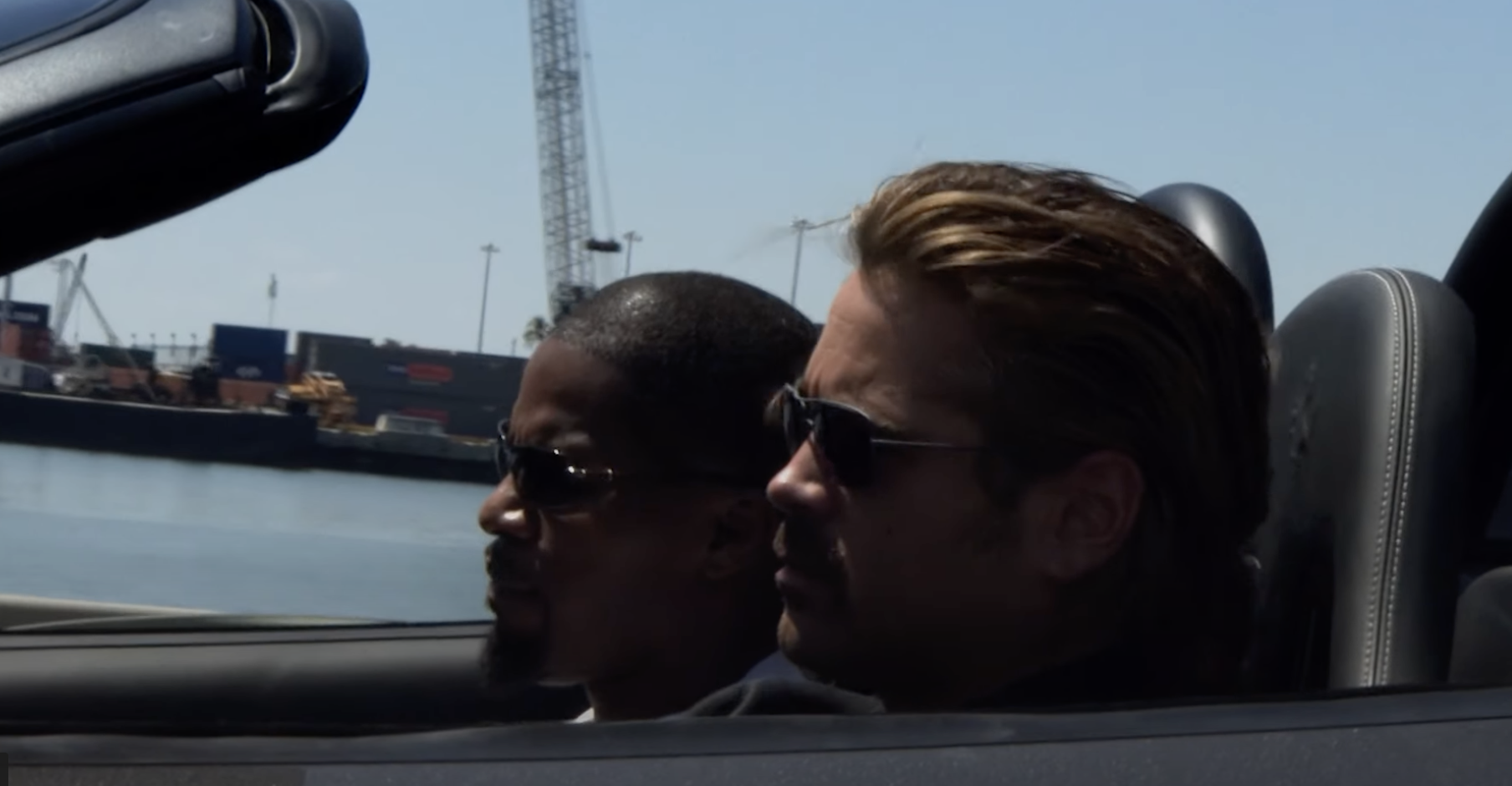 Farrell and Jamie Foxx driving a car in the film