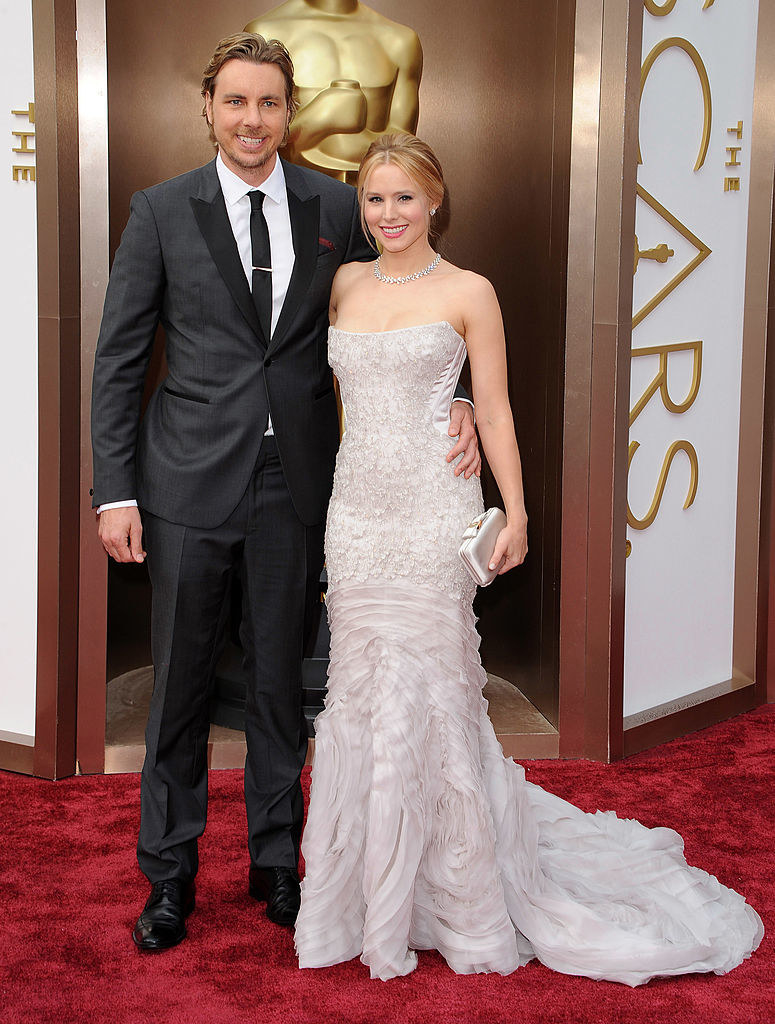 Dax Shepard (L) and Kristen Bell arrive at the 86th Annual Academy Awards