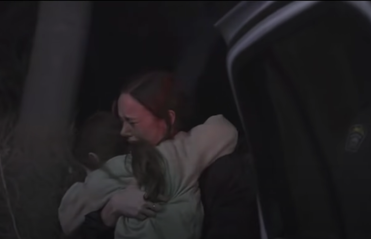 Larson hugging her character&#x27;s son in room