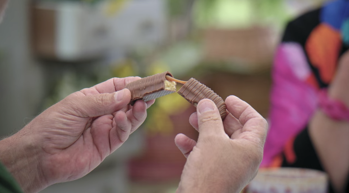 Paul breaking open a Twix