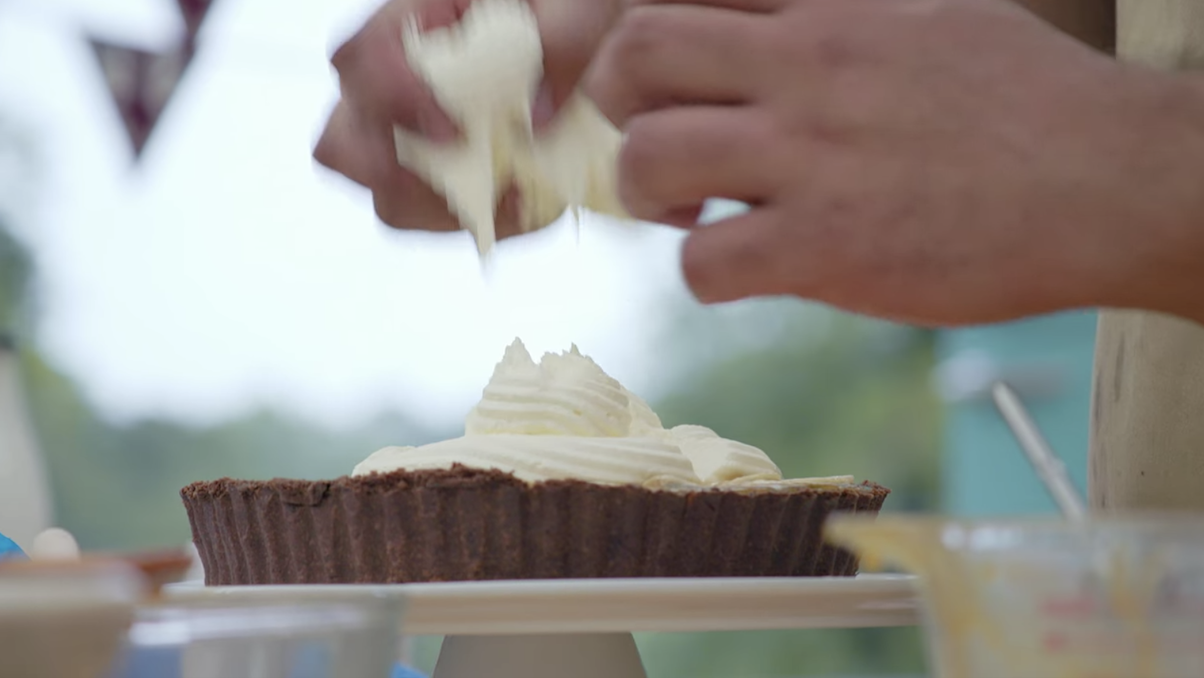 George with a fistful of cream