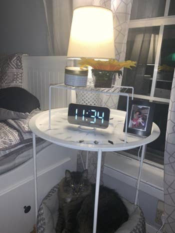 A customer review photo of the clock on their nightstand