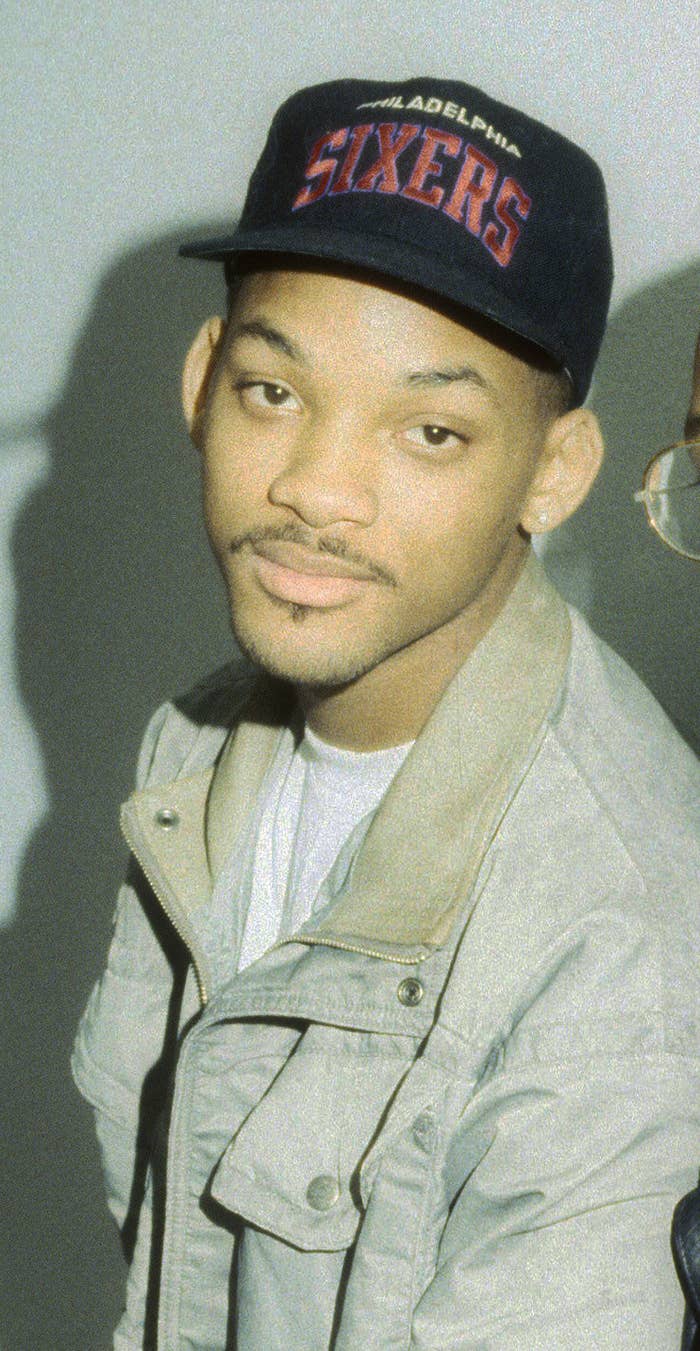 A younger Will Smith in a Philadelphia Sixers baseball cap