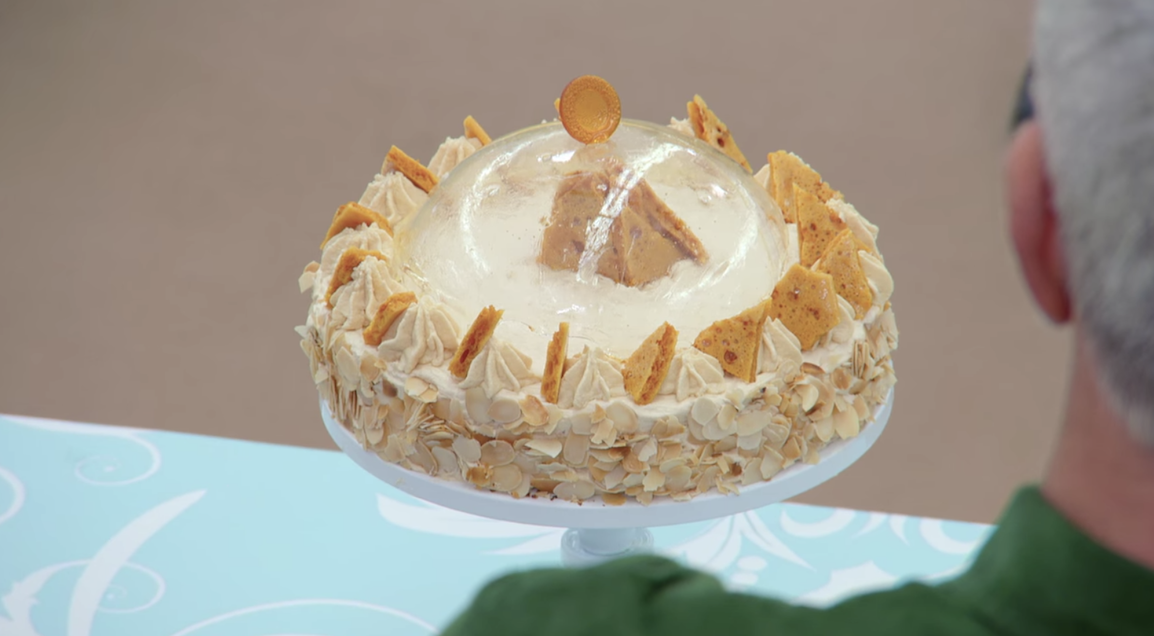George&#x27;s dessert, with clear dome and precise decorations