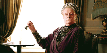 Maggie Smith ringing a bell