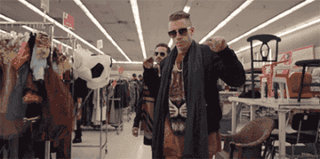 Macklemore dancing in a thrift shop in the Thrift Shop music video