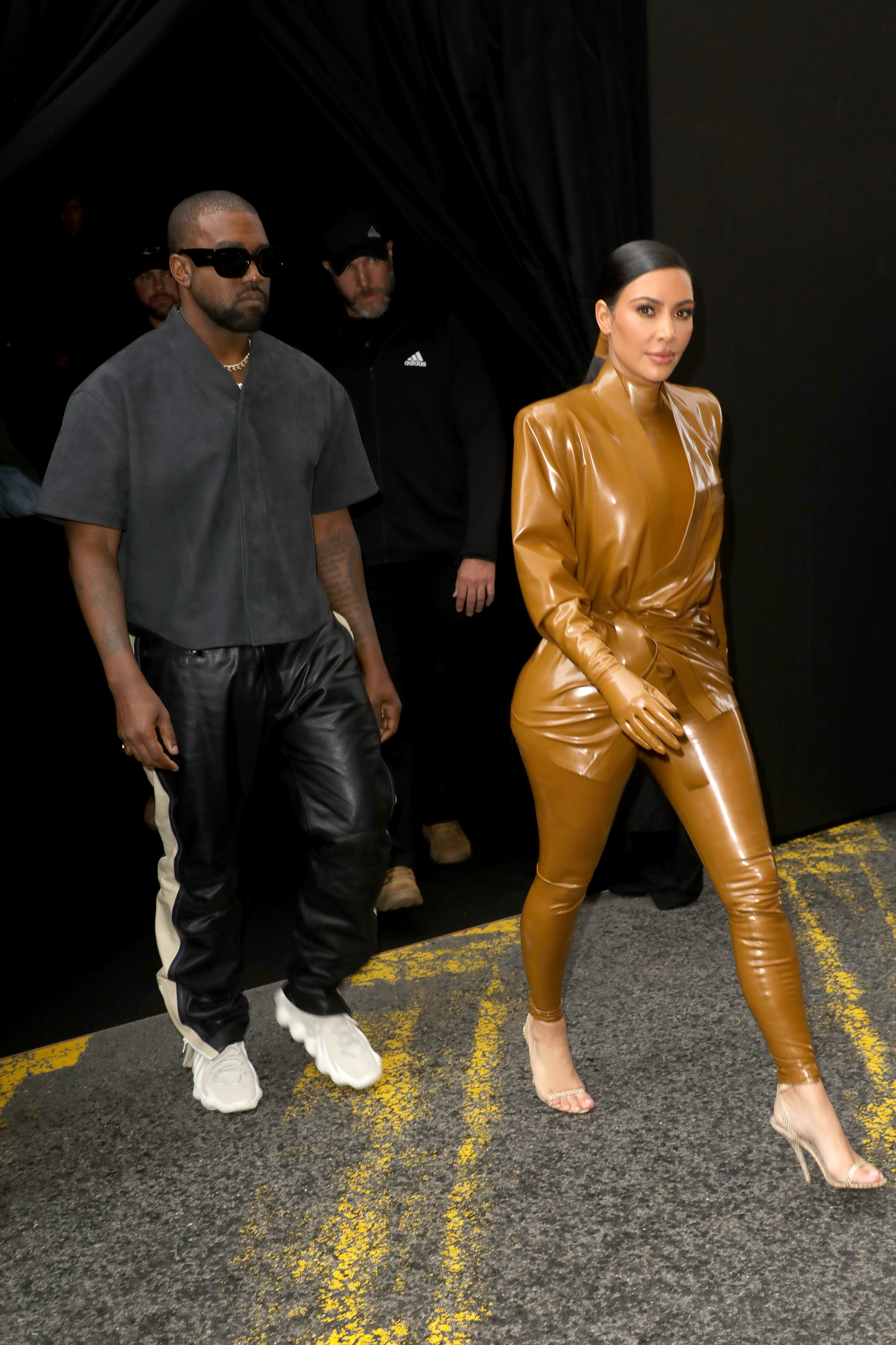 Kanye and Kim walking outside