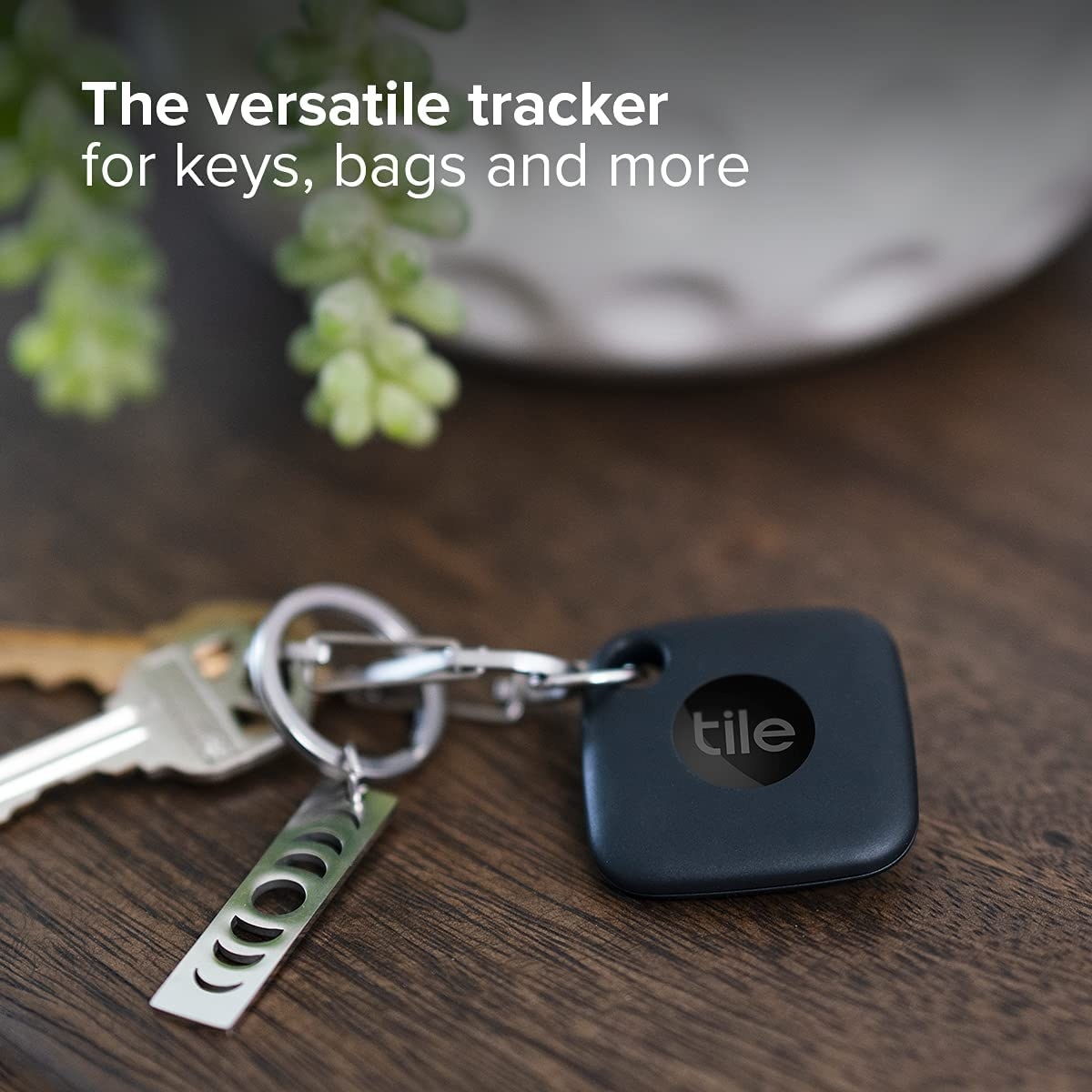 the black square bluetooth tracker on a keychain