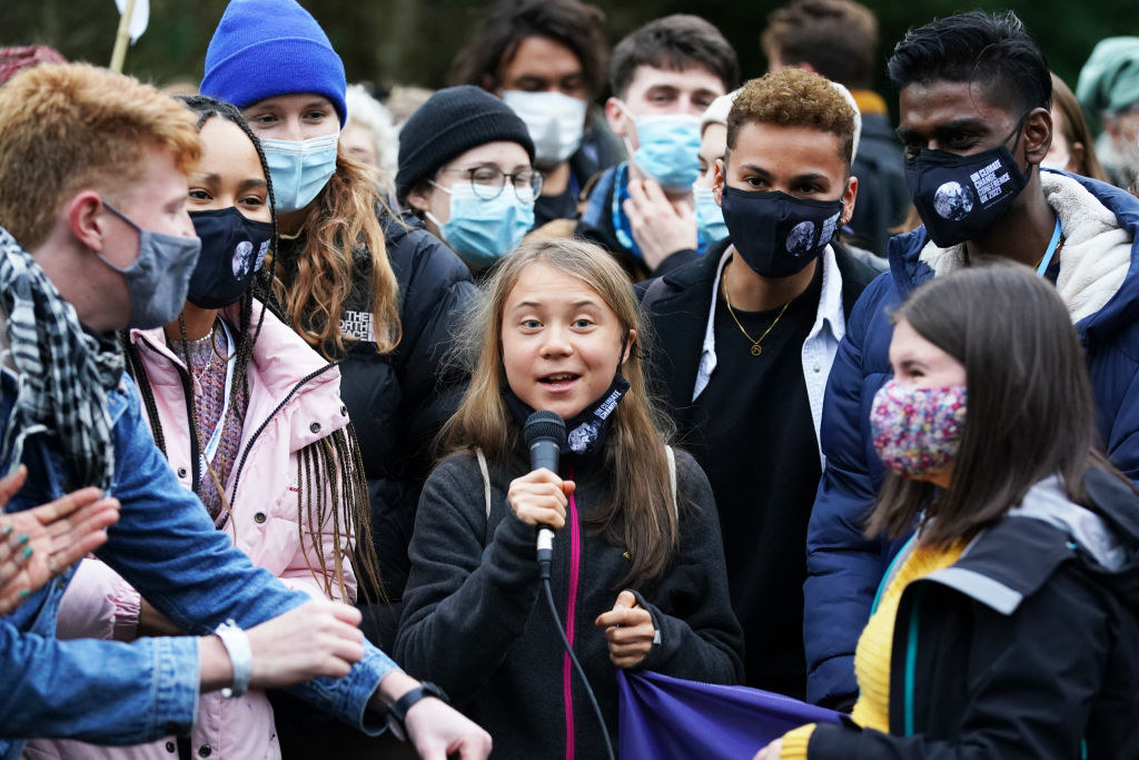 Climate activist Greta Thunberg speaking at a demonstration