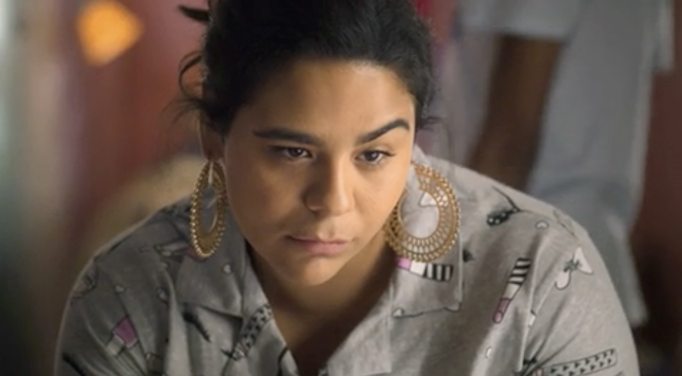 Jasmine from &quot;On My Block&quot; raising her eyebrow and looking unamused