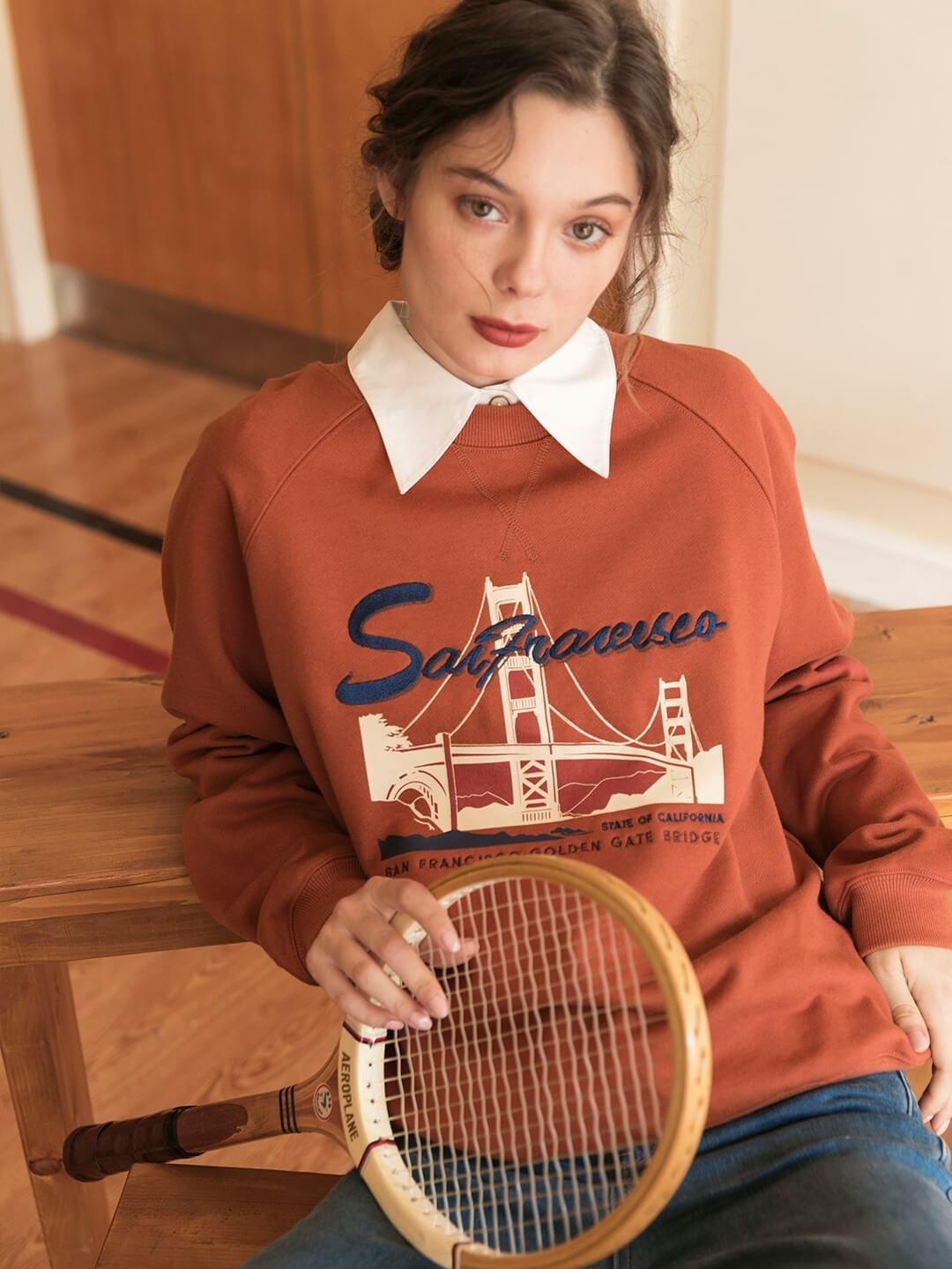 model wearing the San Francisco embroidered sweatshirt