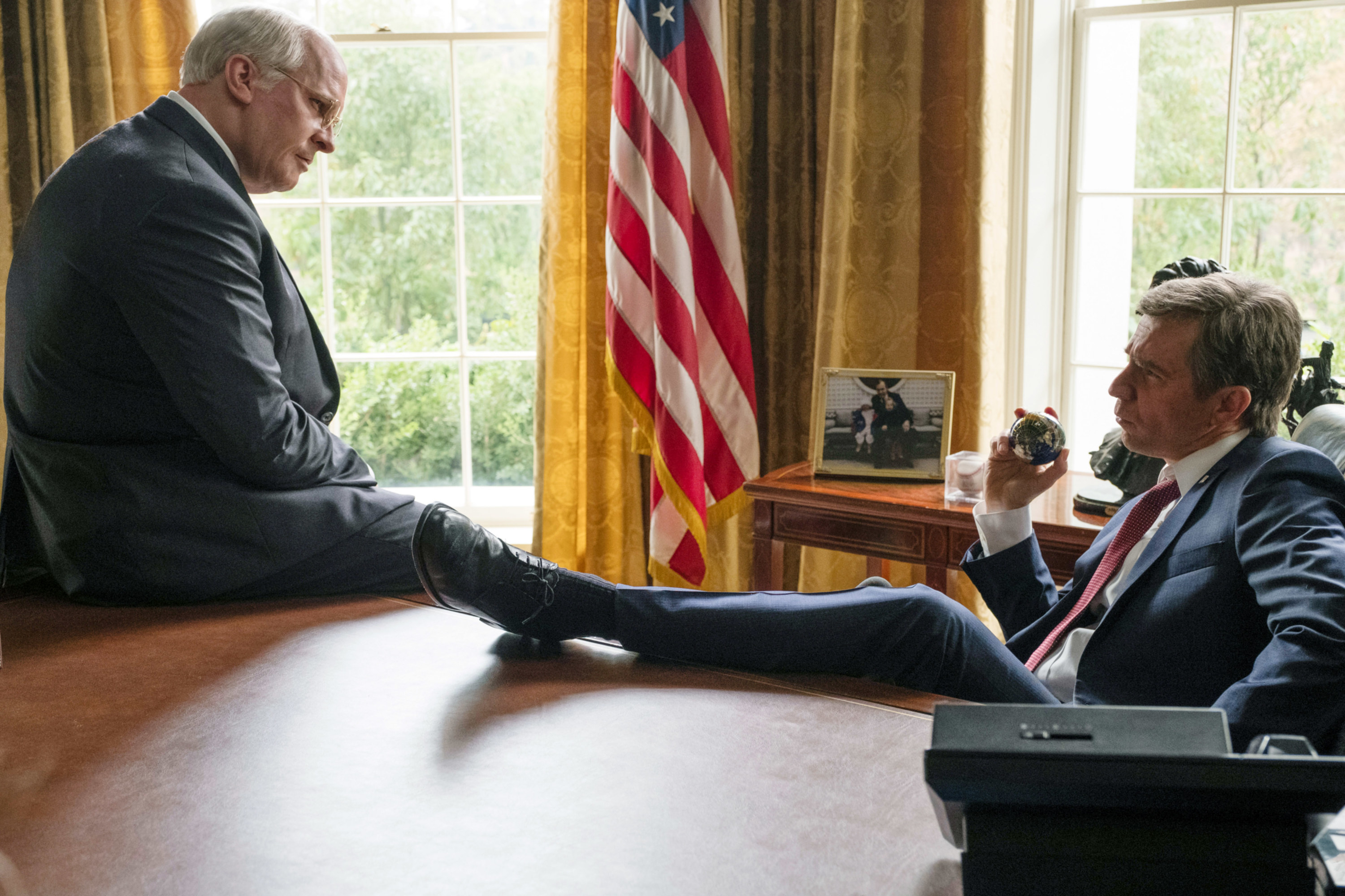Cheney speaking to Bush in the Oval Office