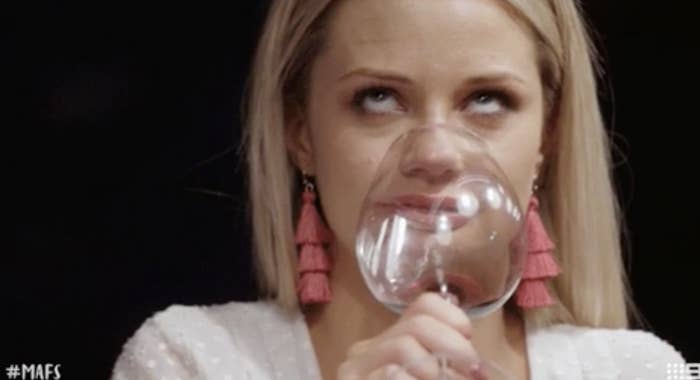 A woman on "Married At First Sight" rolling her eyes