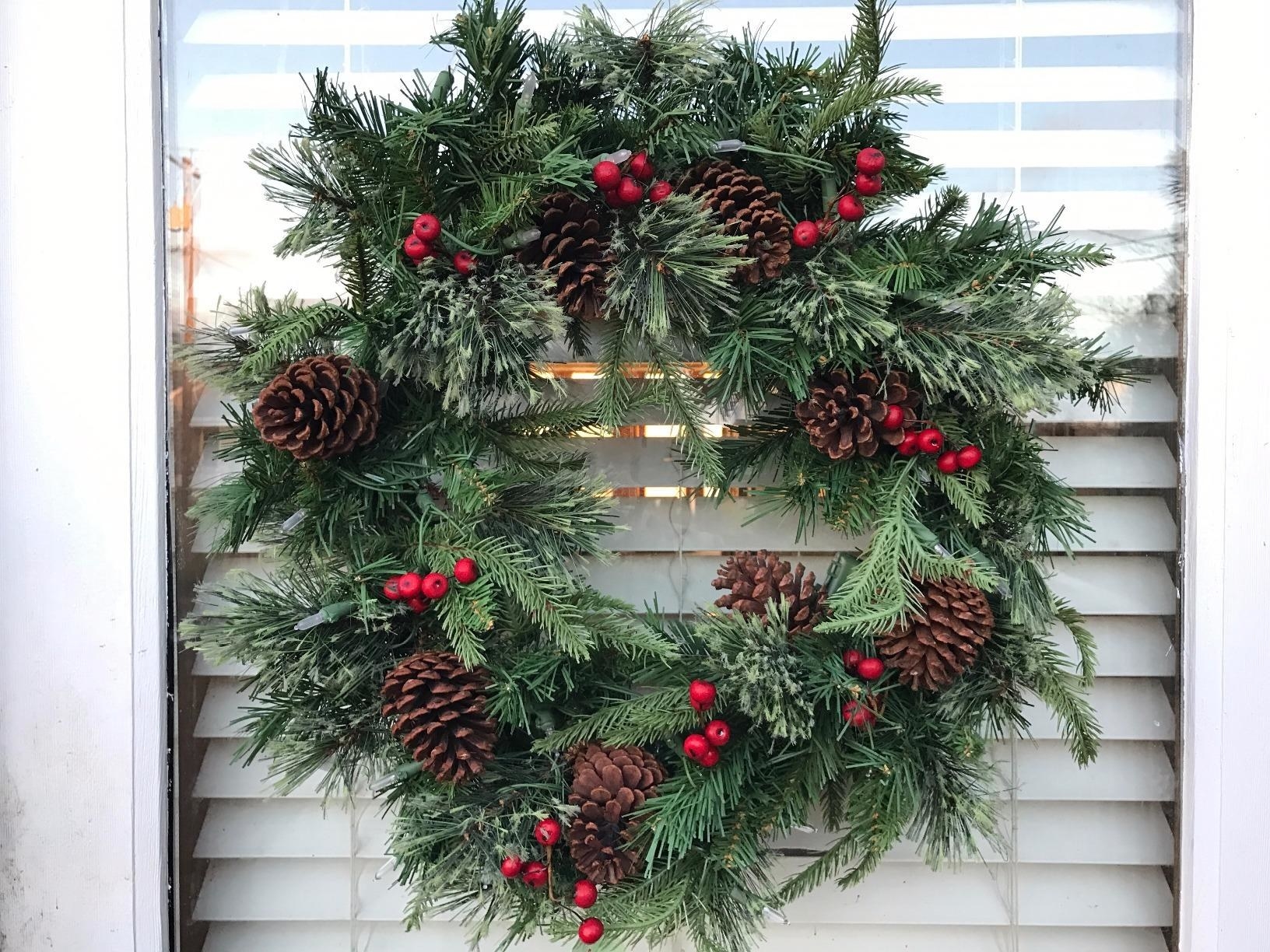 A reviewer&#x27;s front door with the wreath hanging on it