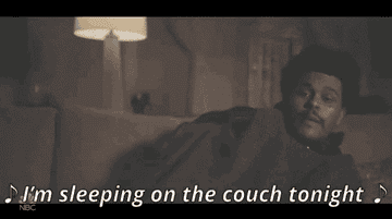 The Weekend laying on the couch singing &quot;I&#x27;m sleeping on the couch tonight&quot;