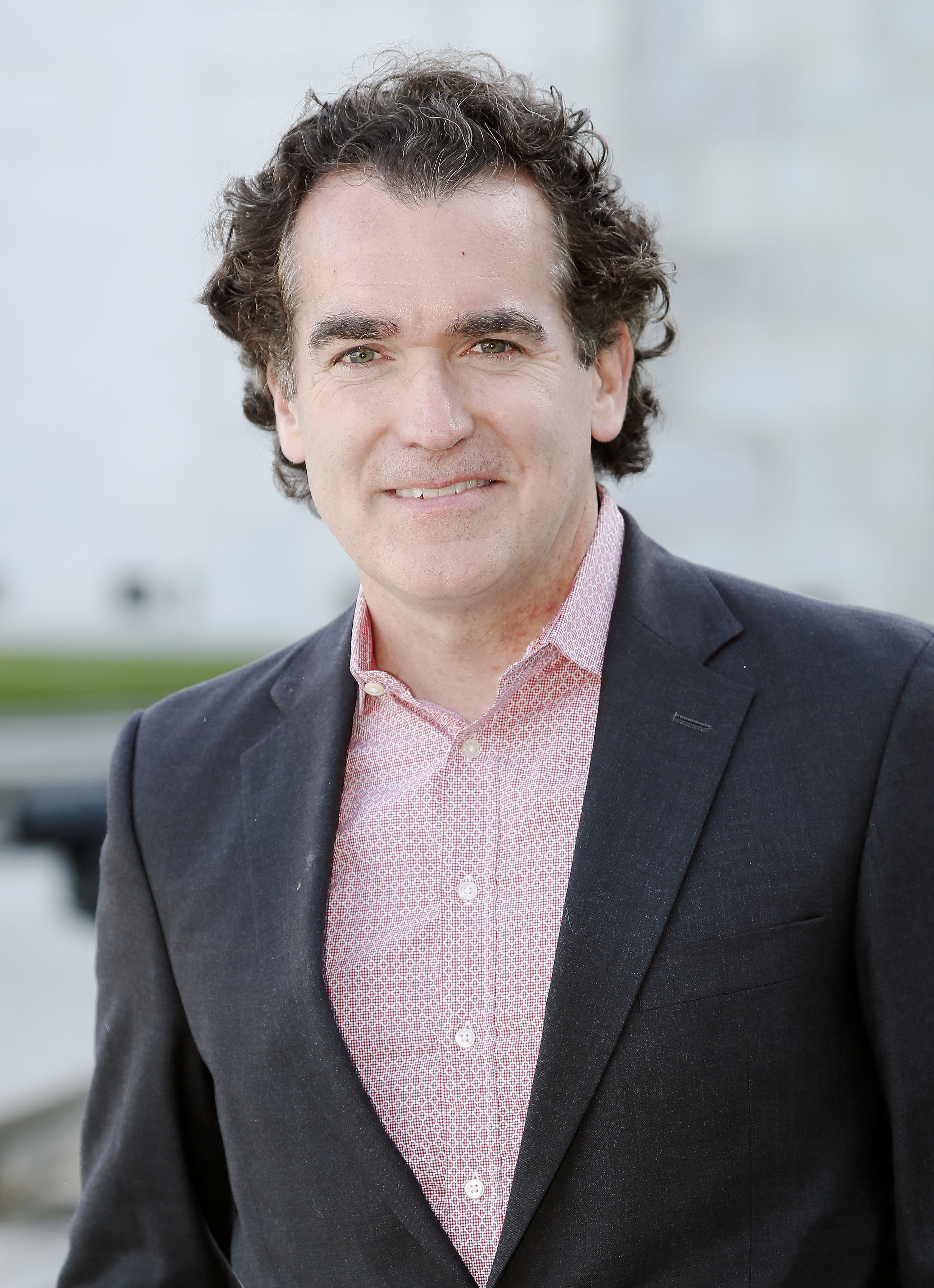 Brian d&#x27;Arcy James smiling.