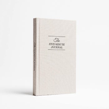 The journal with the white cover