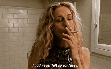 Carrie smoking a cigarette while she narrates &quot;I had never felt so confused&quot;